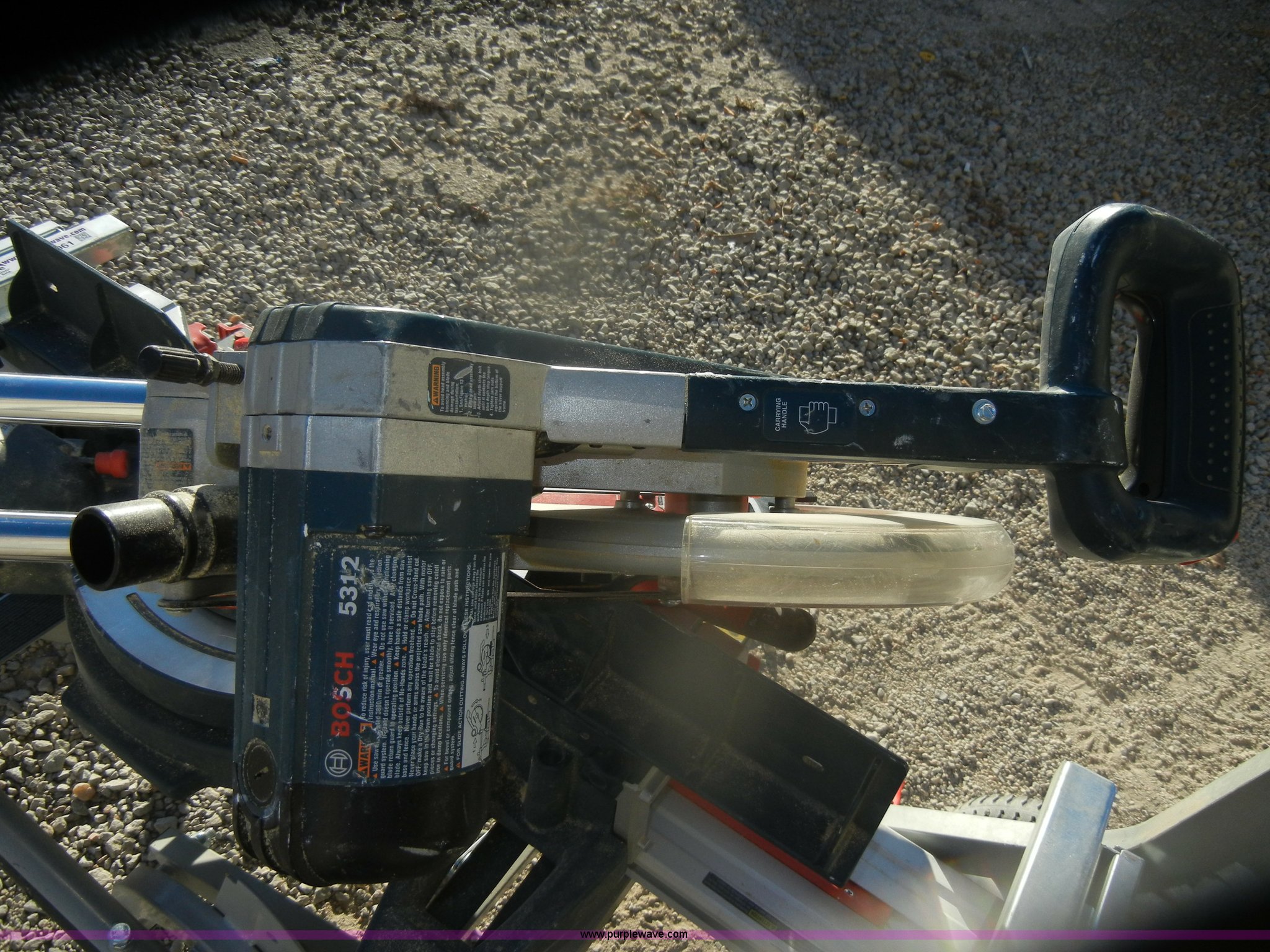 Bosch 5312 12" dual bevel slide miter saw in Topeka, KS Item AB9961