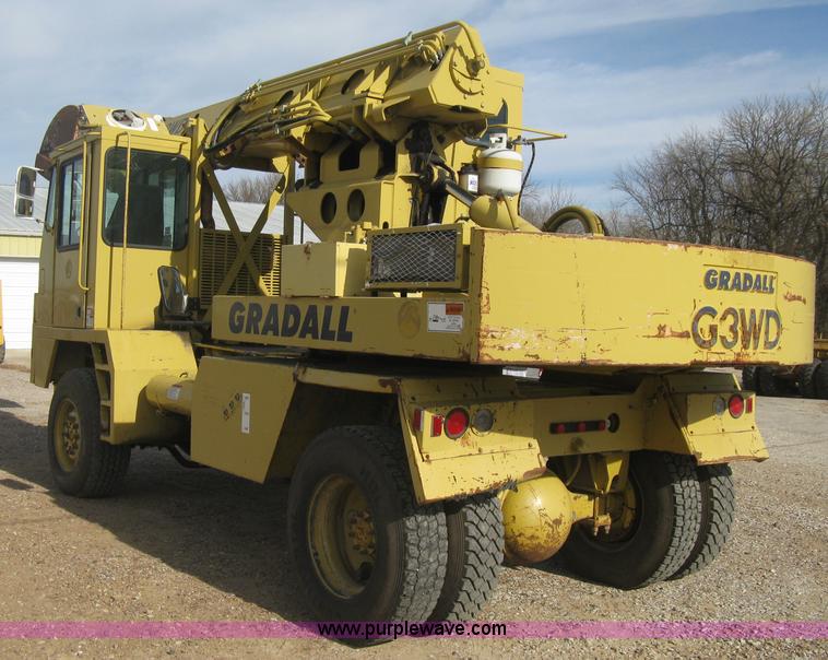 image for item B8499 Gradall G3WD rubber tire hydraulic excavator