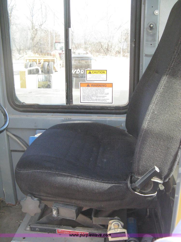 image for item B8499 Gradall G3WD rubber tire hydraulic excavator