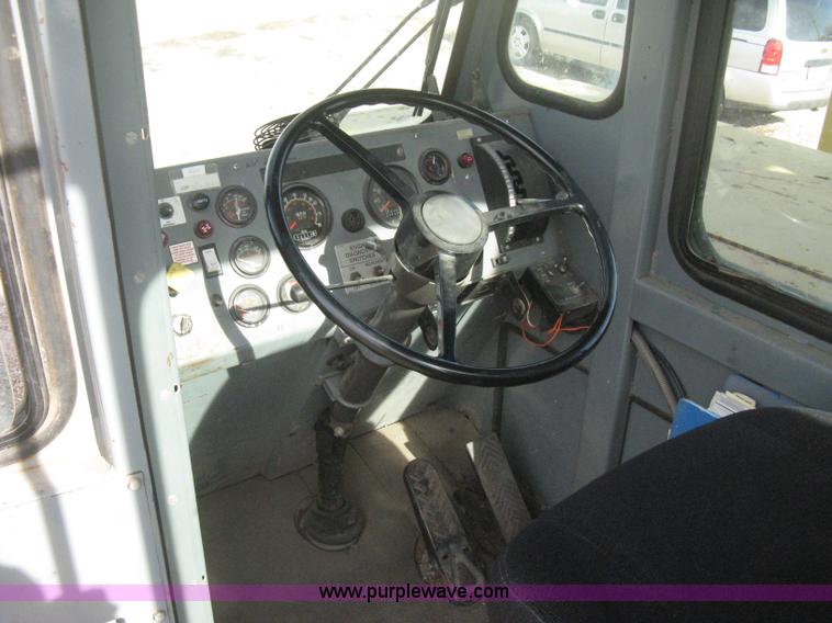 image for item B8499 Gradall G3WD rubber tire hydraulic excavator