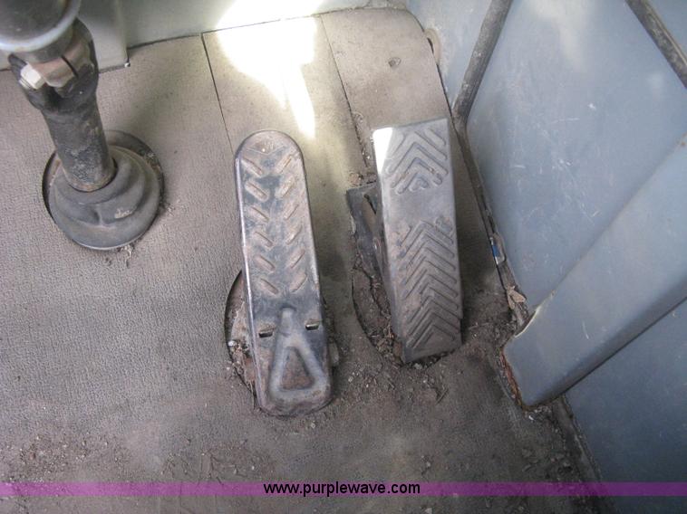 image for item B8499 Gradall G3WD rubber tire hydraulic excavator