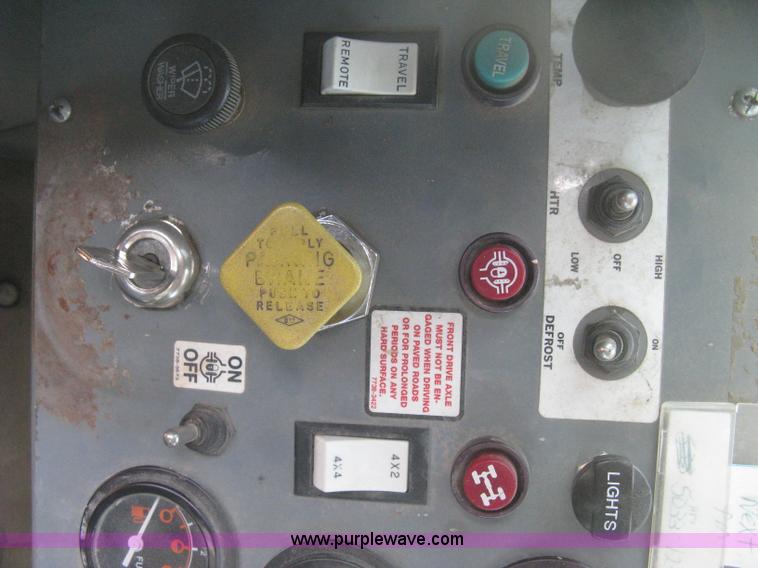 image for item B8499 Gradall G3WD rubber tire hydraulic excavator