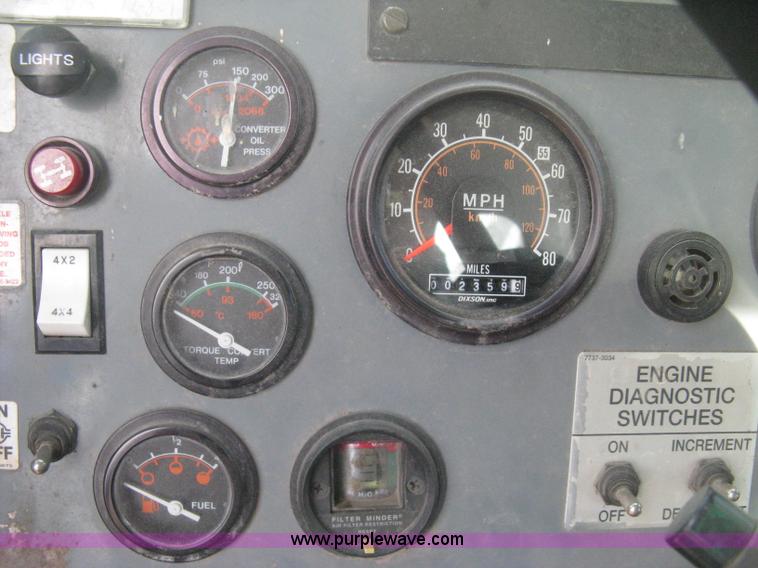 image for item B8499 Gradall G3WD rubber tire hydraulic excavator