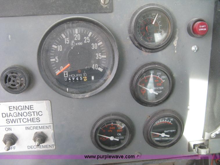 image for item B8499 Gradall G3WD rubber tire hydraulic excavator