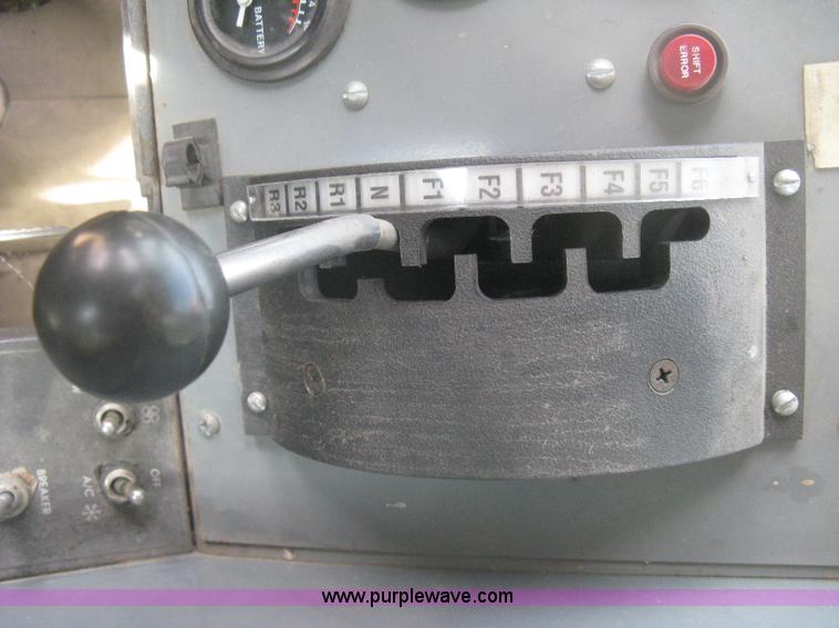 image for item B8499 Gradall G3WD rubber tire hydraulic excavator