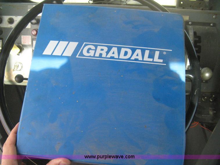 image for item B8499 Gradall G3WD rubber tire hydraulic excavator