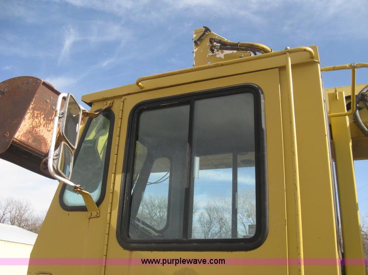 image for item B8499 Gradall G3WD rubber tire hydraulic excavator