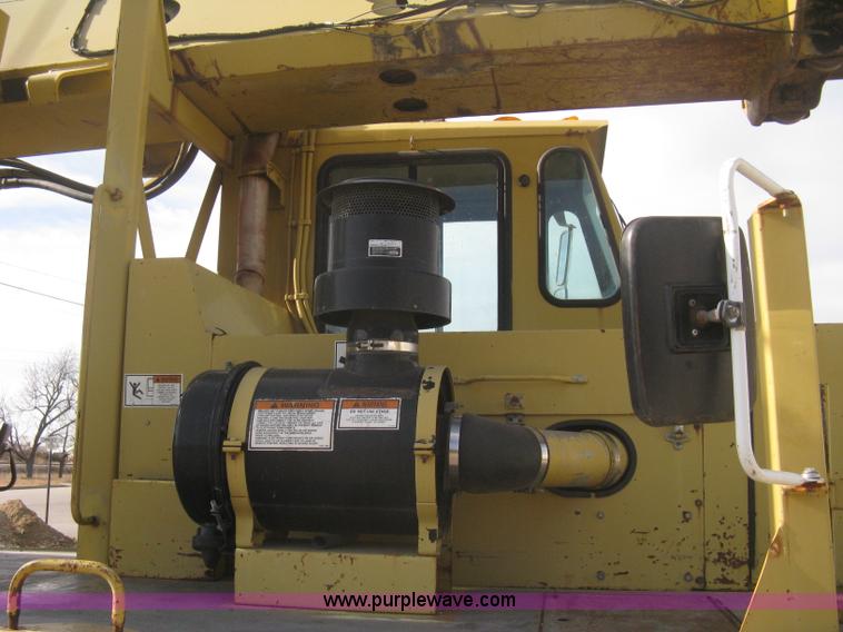 image for item B8499 Gradall G3WD rubber tire hydraulic excavator