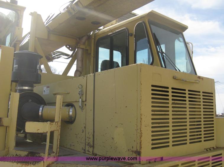 image for item B8499 Gradall G3WD rubber tire hydraulic excavator