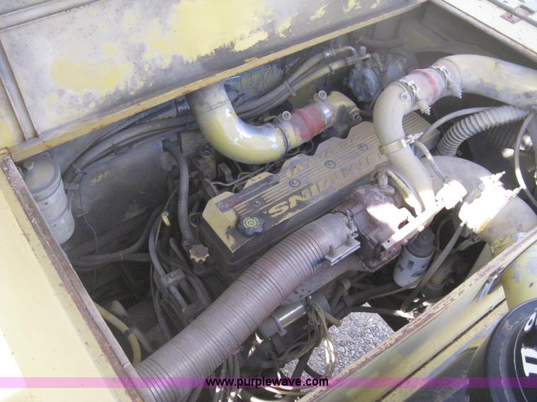 image for item B8499 Gradall G3WD rubber tire hydraulic excavator