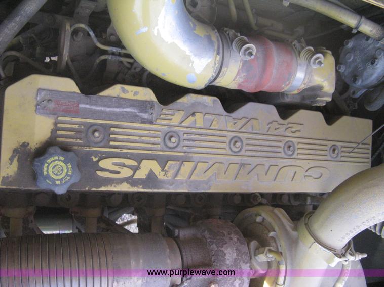 image for item B8499 Gradall G3WD rubber tire hydraulic excavator