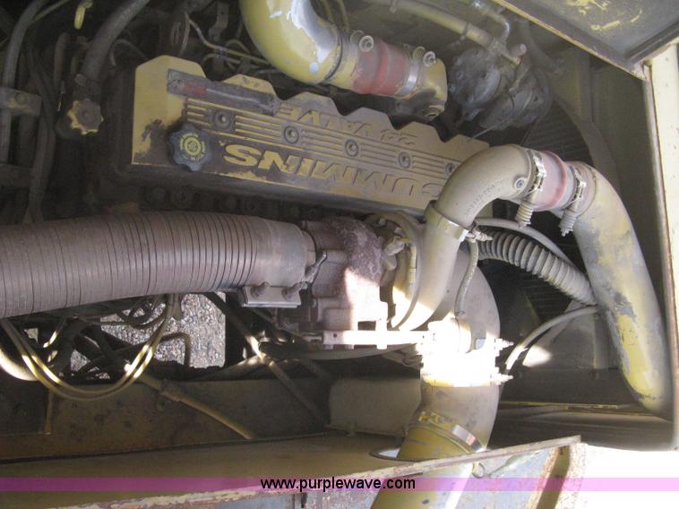 image for item B8499 Gradall G3WD rubber tire hydraulic excavator