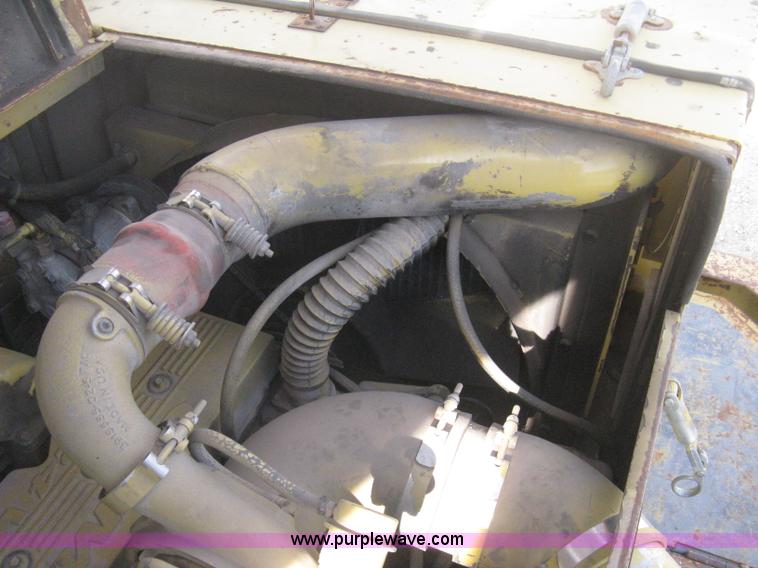 image for item B8499 Gradall G3WD rubber tire hydraulic excavator