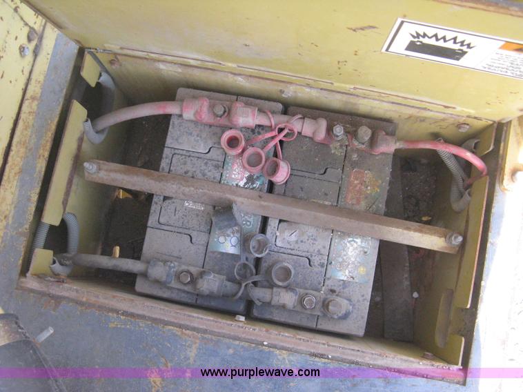 image for item B8499 Gradall G3WD rubber tire hydraulic excavator