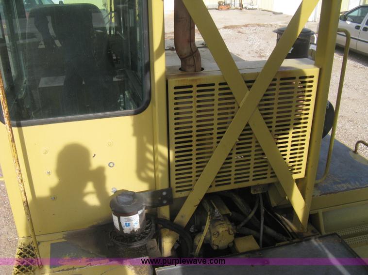 image for item B8499 Gradall G3WD rubber tire hydraulic excavator