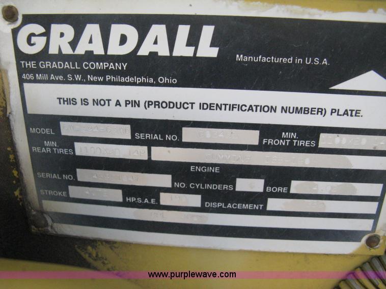 image for item B8499 Gradall G3WD rubber tire hydraulic excavator