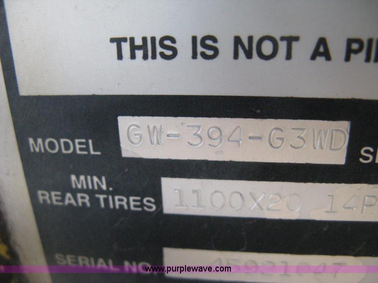 image for item B8499 Gradall G3WD rubber tire hydraulic excavator