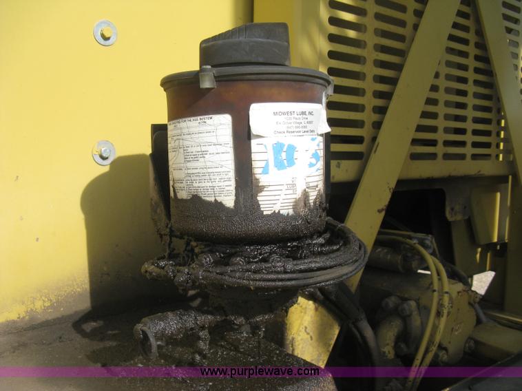 image for item B8499 Gradall G3WD rubber tire hydraulic excavator