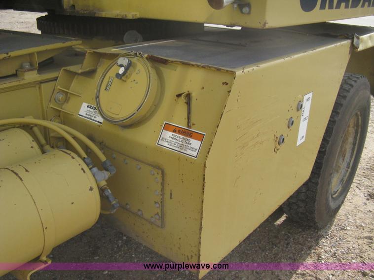 image for item B8499 Gradall G3WD rubber tire hydraulic excavator