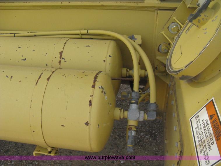 image for item B8499 Gradall G3WD rubber tire hydraulic excavator