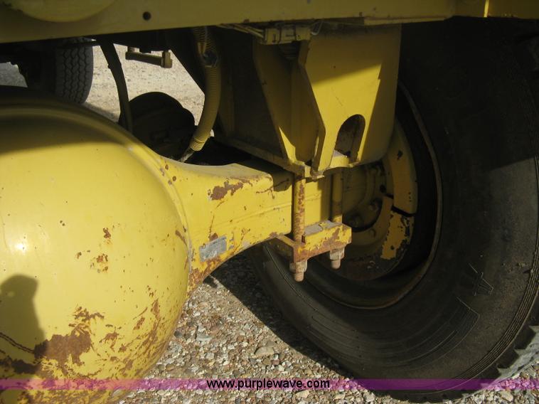 image for item B8499 Gradall G3WD rubber tire hydraulic excavator