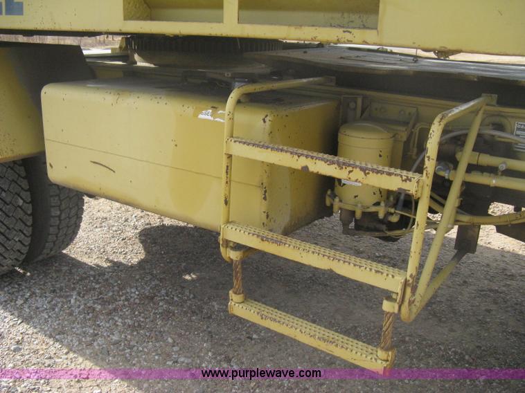 image for item B8499 Gradall G3WD rubber tire hydraulic excavator