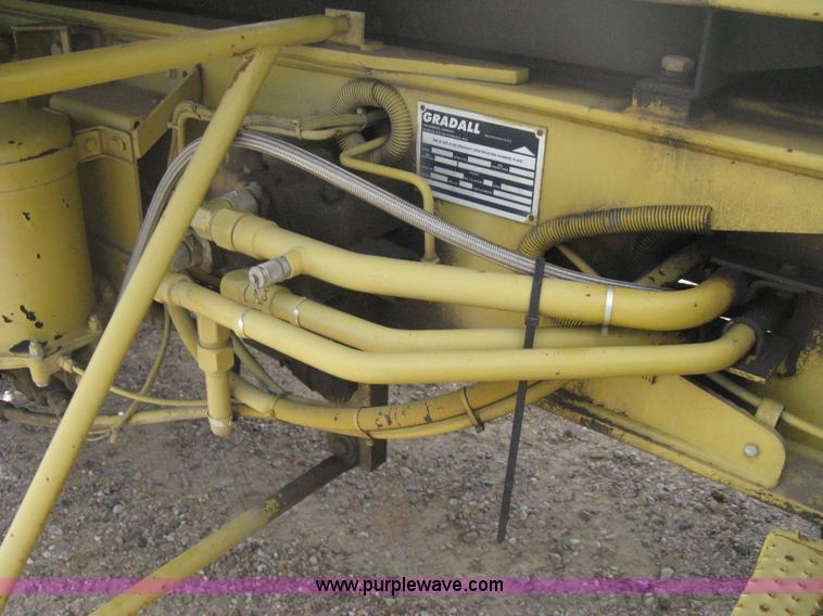 image for item B8499 Gradall G3WD rubber tire hydraulic excavator