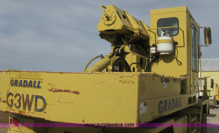 image for item B8499 Gradall G3WD rubber tire hydraulic excavator