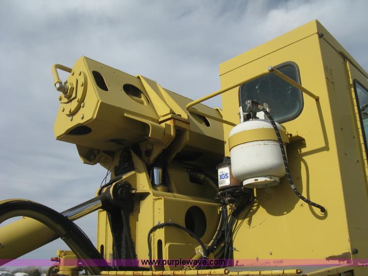 image for item B8499 Gradall G3WD rubber tire hydraulic excavator