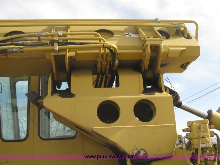 image for item B8499 Gradall G3WD rubber tire hydraulic excavator