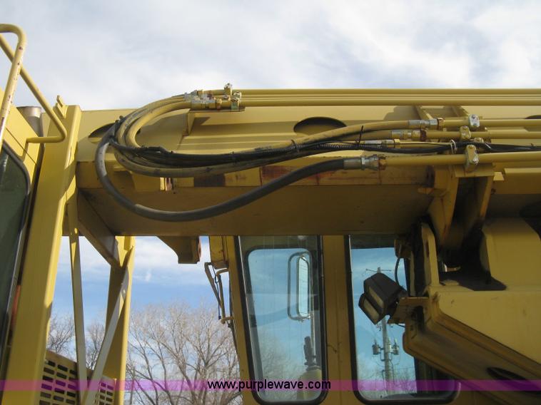 image for item B8499 Gradall G3WD rubber tire hydraulic excavator