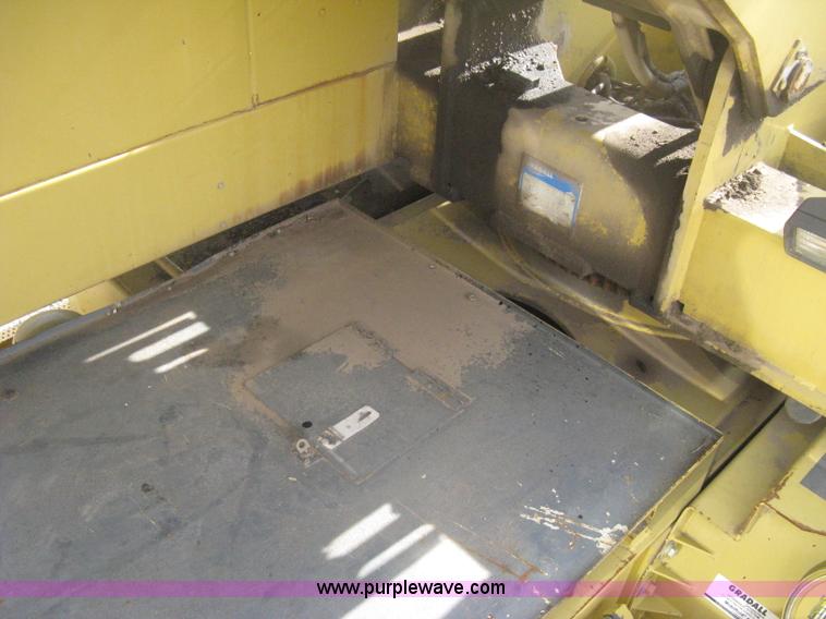 image for item B8499 Gradall G3WD rubber tire hydraulic excavator