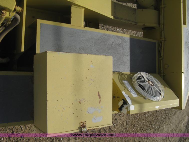 image for item B8499 Gradall G3WD rubber tire hydraulic excavator