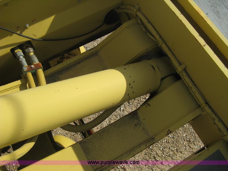 image for item B8499 Gradall G3WD rubber tire hydraulic excavator