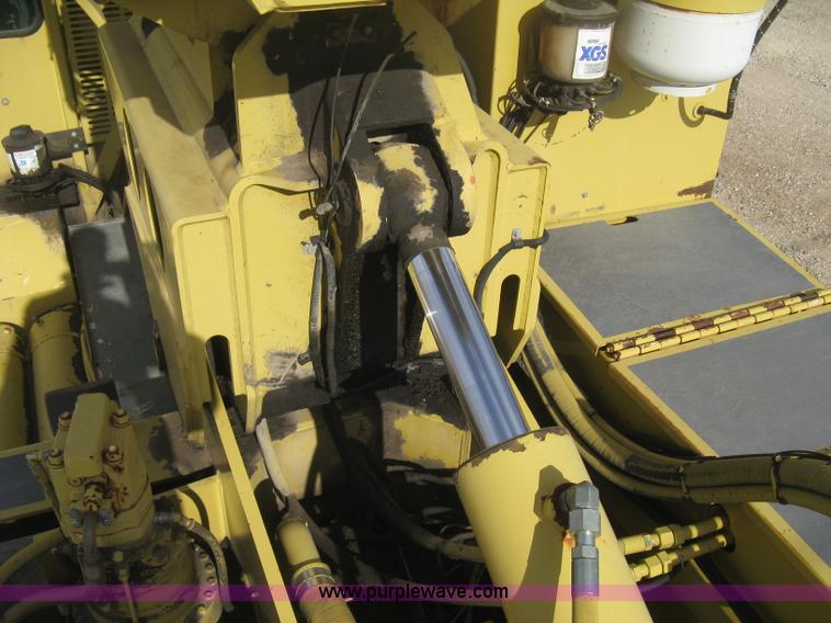 image for item B8499 Gradall G3WD rubber tire hydraulic excavator