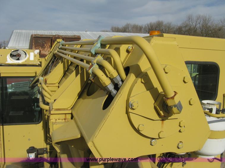 image for item B8499 Gradall G3WD rubber tire hydraulic excavator