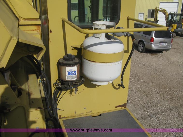 image for item B8499 Gradall G3WD rubber tire hydraulic excavator