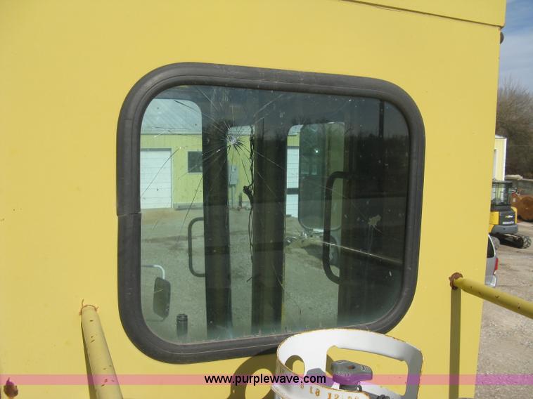 image for item B8499 Gradall G3WD rubber tire hydraulic excavator