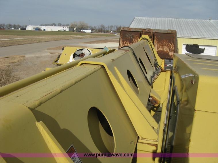 image for item B8499 Gradall G3WD rubber tire hydraulic excavator