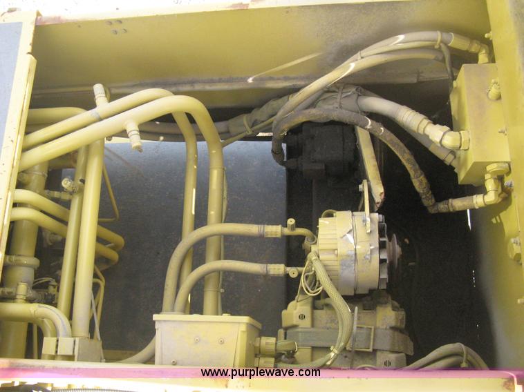 image for item B8499 Gradall G3WD rubber tire hydraulic excavator