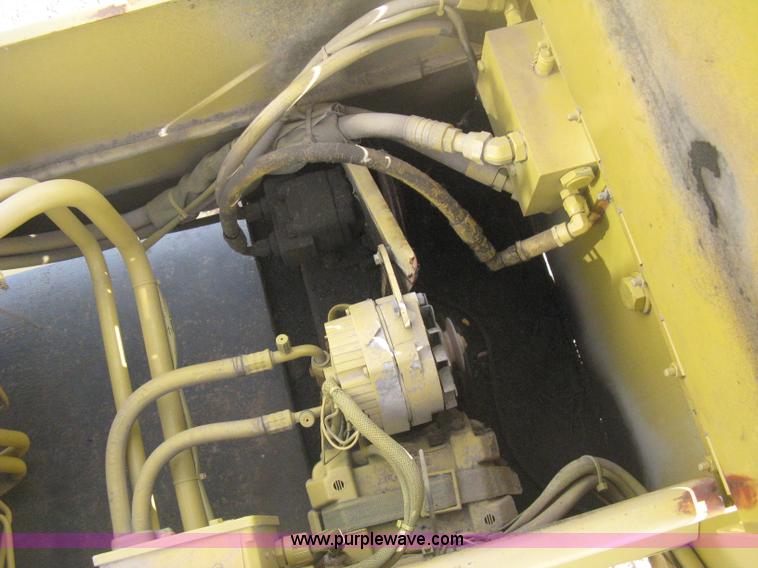 image for item B8499 Gradall G3WD rubber tire hydraulic excavator