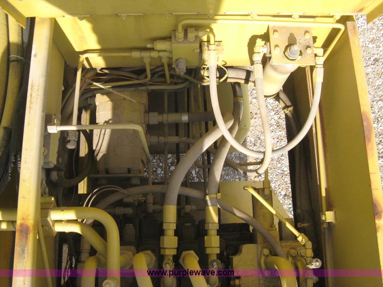 image for item B8499 Gradall G3WD rubber tire hydraulic excavator