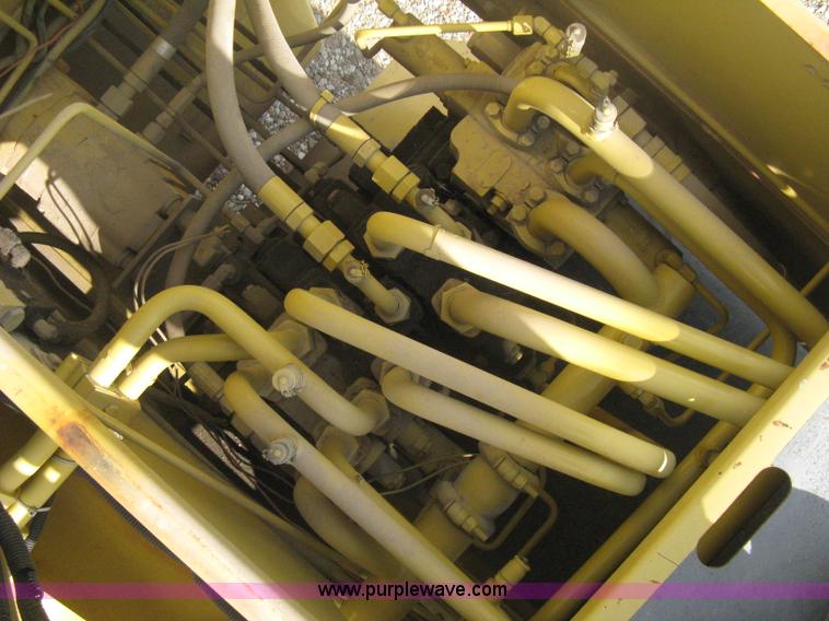 image for item B8499 Gradall G3WD rubber tire hydraulic excavator