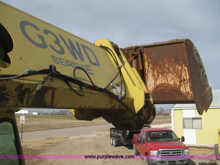 image for item B8499 Gradall G3WD rubber tire hydraulic excavator