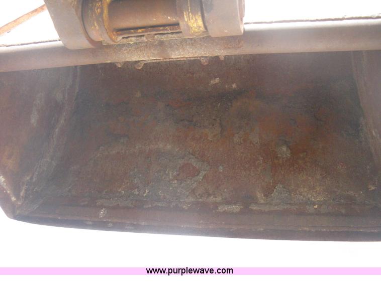 image for item B8499 Gradall G3WD rubber tire hydraulic excavator