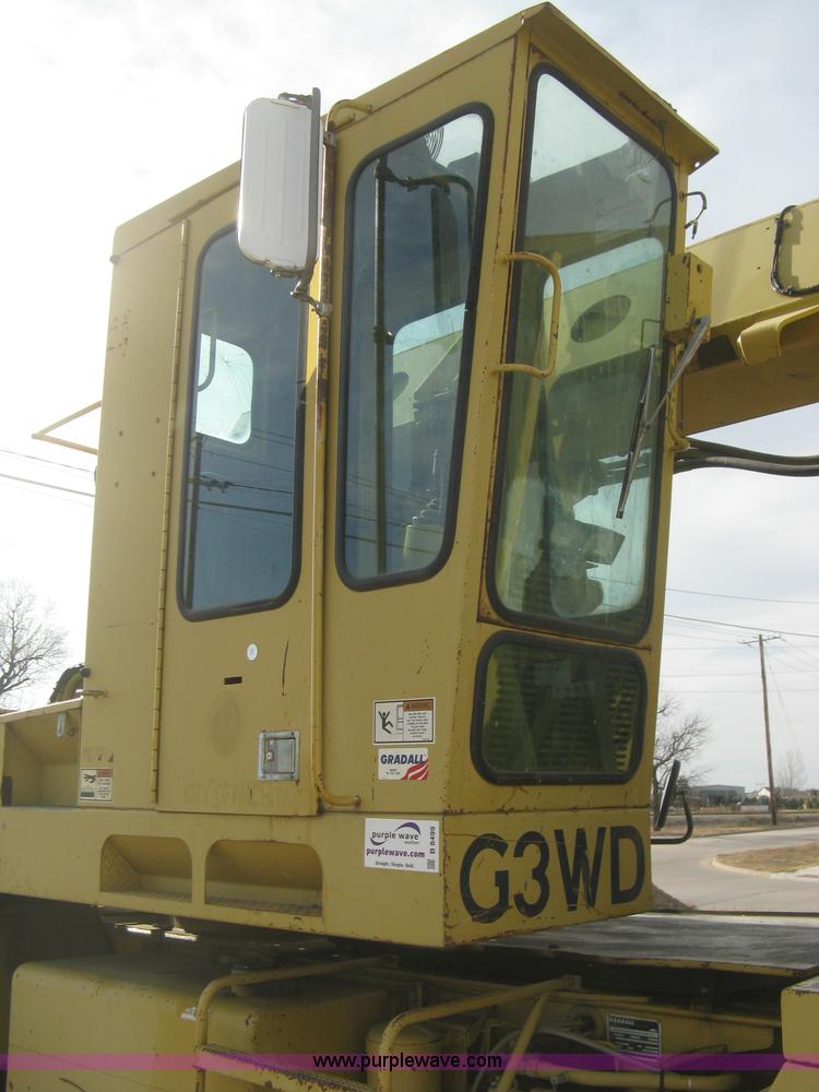 image for item B8499 Gradall G3WD rubber tire hydraulic excavator