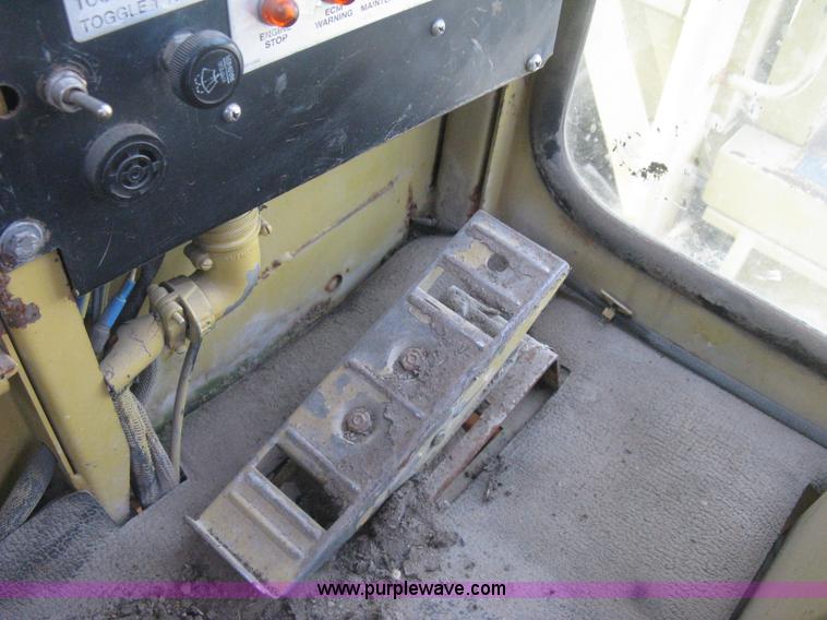 image for item B8499 Gradall G3WD rubber tire hydraulic excavator