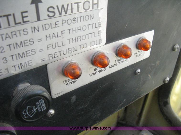 image for item B8499 Gradall G3WD rubber tire hydraulic excavator