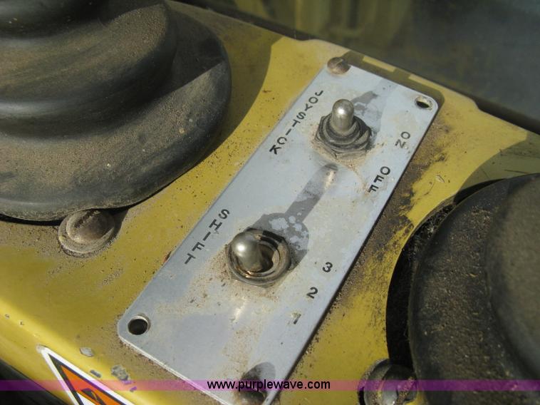 image for item B8499 Gradall G3WD rubber tire hydraulic excavator