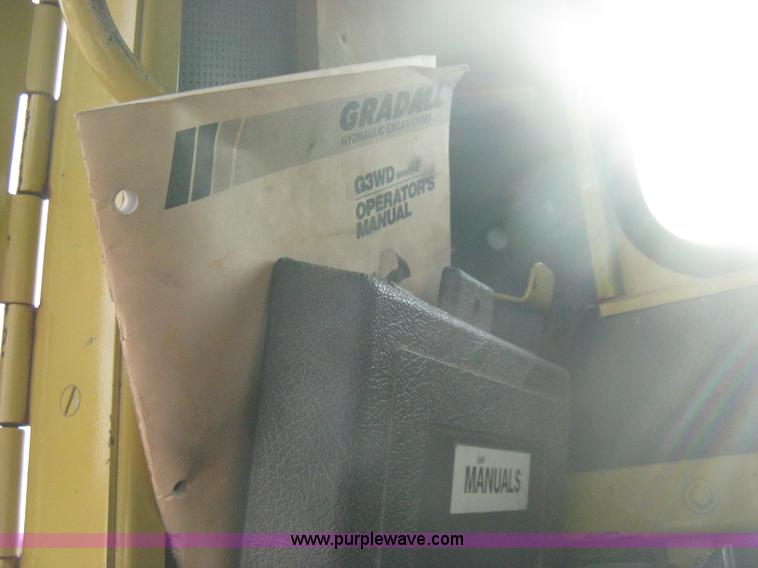 image for item B8499 Gradall G3WD rubber tire hydraulic excavator